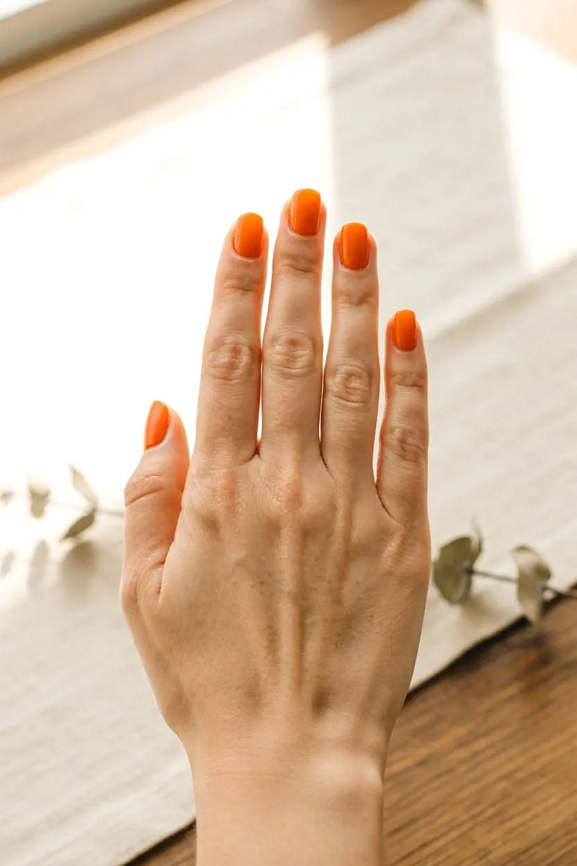 Modern Short Orange Nails Design